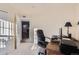 Home office offers comfortable workspace and natural light at 12338 W Dorado Pl # 107, Littleton, CO 80127