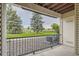 Covered patio overlooking green space at 12338 W Dorado Pl # 107, Littleton, CO 80127
