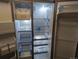 Inside view of the refrigerator, showing adjustable shelves, clear drawers, and ample storage space at 12338 W Dorado Pl # 107, Littleton, CO 80127