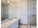 Bathroom featuring a glass shower and modern fixtures at 14855 Almstead St, Hudson, CO 80642