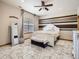 Bright bedroom with stylish furnishings, marble floors, and ample natural light creating a cozy and inviting space at 14855 Almstead St, Hudson, CO 80642