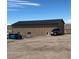 Exterior shot of metal garage and yard at 14855 Almstead St, Hudson, CO 80642
