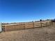 Wide open land featuring a wooden fence, offering privacy and security for agricultural use or development at 14855 Almstead St, Hudson, CO 80642