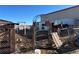 Paddock with gate and horse in rural setting at 14855 Almstead St, Hudson, CO 80642