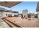 Spacious wooden deck with outdoor seating, a fireplace, and a clear view at 336 N Grant St # 412, Denver, CO 80203