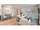 Comfortable living area with modern furniture, a dining table, and stylish decor, creating an inviting and functional space at 336 N Grant St # 412, Denver, CO 80203