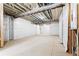 Unfinished basement with exposed ceiling at 6675 Fawn Path Ln, Castle Pines, CO 80108