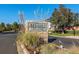 Bel-Aire Estates entrance with brick signage surrounded by grass and lush landscaping, offering a welcoming community entrance at 4275 S Dawson St, Aurora, CO 80014