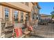 Outdoor deck featuring patio furniture, a grill, and well-manicured landscaping at 4275 S Dawson St, Aurora, CO 80014