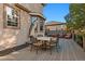 Spacious deck with a table set and umbrella for outdoor dining and lounging at 4275 S Dawson St, Aurora, CO 80014