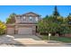 Charming two-story home featuring a two-car garage and well-maintained front yard at 4275 S Dawson St, Aurora, CO 80014