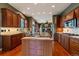 Bright kitchen showcasing granite countertops, stainless appliances, and a clear view to the living area at 4275 S Dawson St, Aurora, CO 80014