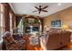 Comfortable living room featuring a fireplace and ample seating at 4275 S Dawson St, Aurora, CO 80014