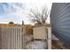 Backyard with dog house and fence at 831 Centennial Dr, Bennett, CO 80102