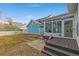 Backyard with partial deck and enclosed sunroom at 5129 Mt Arapaho Cir, Frederick, CO 80504