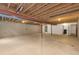 Unfinished basement with exposed ceiling and concrete walls at 5129 Mt Arapaho Cir, Frederick, CO 80504