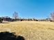 Expansive community park featuring a playground and residential homes in the background at 5129 Mt Arapaho Cir, Frederick, CO 80504