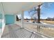 Covered front porch provides the perfect spot to relax while enjoying views of the neighborhood at 5129 Mt Arapaho Cir, Frederick, CO 80504