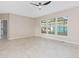 Another view of living room highlighting the large windows and neutral design at 5129 Mt Arapaho Cir, Frederick, CO 80504