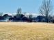 Neighborhood playground with various play structures and open green space at 5129 Mt Arapaho Cir, Frederick, CO 80504