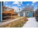 Backyard featuring a blue shed and a small tree at 1430 Fairfax St, Denver, CO 80220