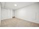 Finished basement offers neutral carpet and storage space at 1430 Fairfax St, Denver, CO 80220