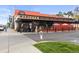 Street view of Marczyk Fine Foods, a wine shop, produce and cheese grocery store with outdoor seating at 1430 Fairfax St, Denver, CO 80220