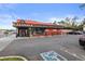 Street view of Marczyk Fine Foods, a wine shop, produce and cheese grocery store with outdoor seating at 1430 Fairfax St, Denver, CO 80220