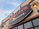 Marczyk Fine Foods signage on a brick building with clear windows in Denver, Colorado at 1430 Fairfax St, Denver, CO 80220