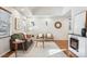 Sunlit living room with hardwood floors, modern fireplace and neutral decor for comfortable living at 1430 Fairfax St, Denver, CO 80220