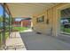 Covered back patio provides a great outdoor space for entertaining or relaxing with views of the yard at 2236 S Osceola St, Denver, CO 80219