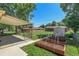 Expansive backyard featuring a shed, garden, patio, and lush lawn, ideal for outdoor relaxation and recreation at 2236 S Osceola St, Denver, CO 80219
