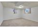 Finished basement featuring carpet and a window for natural light at 2236 S Osceola St, Denver, CO 80219