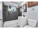 Stylish bathroom with a dark tile backsplash and modern fixtures at 2236 S Osceola St, Denver, CO 80219