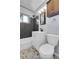 Stylish bathroom featuring a dark tile backsplash and modern fixtures at 2236 S Osceola St, Denver, CO 80219