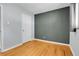 This comfortable bedroom features hardwood floors and neutral paint at 2236 S Osceola St, Denver, CO 80219