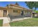 Charming covered patio featuring decorative metal railings, providing a cozy outdoor seating area at 2236 S Osceola St, Denver, CO 80219