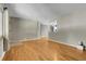 Spacious living room featuring beautiful hardwood floors and neutral tones at 2236 S Osceola St, Denver, CO 80219