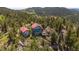 Beautiful home and guest house nestled among the trees on the mountain at 3945 Douglas Mountain Dr, Golden, CO 80403
