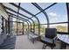 The sun room has lots of natural light and great views of the surrounding mountains at 3945 Douglas Mountain Dr, Golden, CO 80403