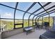 Relaxing sun room with a sitting area and views of the surrounding mountain landscape at 3945 Douglas Mountain Dr, Golden, CO 80403