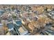 Neighborhood aerial view showcasing cozy homes, tree-lined streets, and classic charm under a bright sky at 4518 Elm Ct, Denver, CO 80211