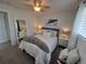Comfortable bedroom featuring neutral colors, cozy decor, and plush carpets at 15945 Delta Ct, Brighton, CO 80603