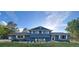 Charming two-story home with a manicured front yard and lovely flower boxes, showcasing curb appeal at 15945 Delta Ct, Brighton, CO 80603