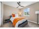 Bright bedroom with bed, window view, and neutral tones at 3480 Mount Powell Dr, Broomfield, CO 80023