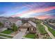 Charming home with a well-maintained front yard and a two-car garage in a quiet neighborhood at 3480 Mount Powell Dr, Broomfield, CO 80023