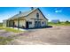 Spacious barn featuring large doors and ample outdoor space at 46122 County Road 53, Bennett, CO 80102