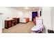 Cozy bedroom with carpet flooring, white furniture, and ample natural light at 46122 County Road 53, Bennett, CO 80102