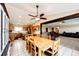 Bright dining area seamlessly connecting to the living room and kitchen at 46122 County Road 53, Bennett, CO 80102