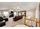 Open living area with a cozy fireplace and comfortable leather seating at 46122 County Road 53, Bennett, CO 80102